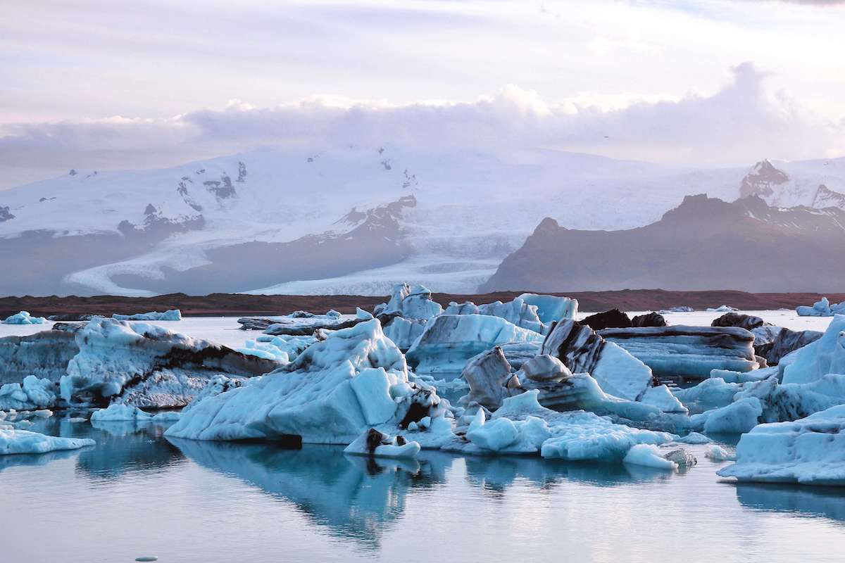 Image of icebergs with sun in the back